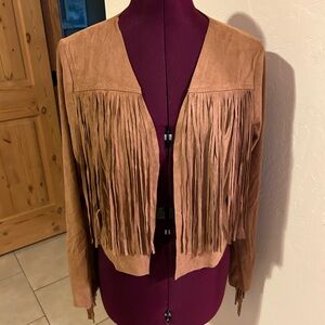 Vocal fringed faux suede jacket.